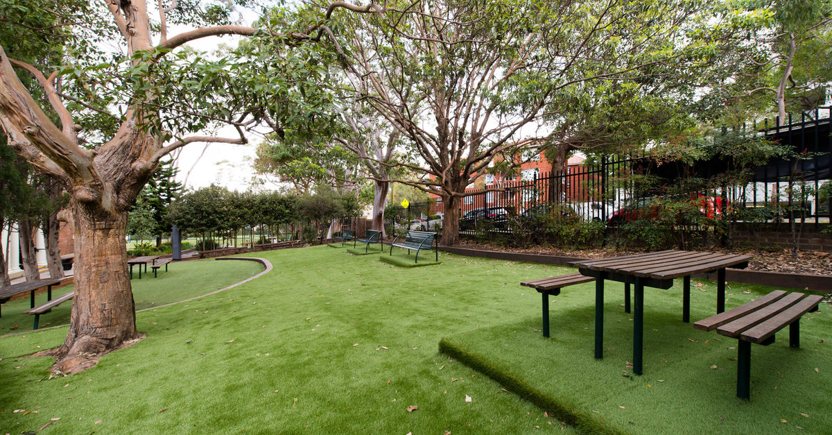 Synthetic lawn and playground area in a Sydney garden